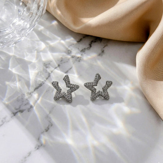 Comet Dust Studs